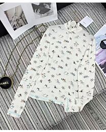 Chanel Women's Coconege Turtleneck Long Sleeve Ski Ribbon Top Cream